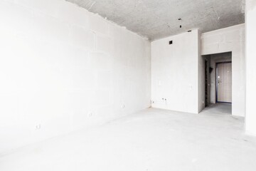 interior of the apartment without decoration in gray colors. rough finish