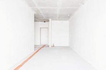 interior of the apartment without decoration in gray colors. rough finish