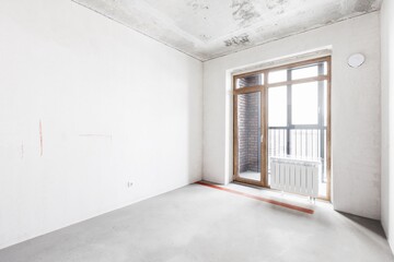 interior of the apartment without decoration in gray colors. rough finish