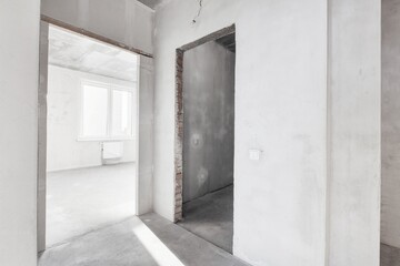 interior of the apartment without decoration in gray colors. rough finish