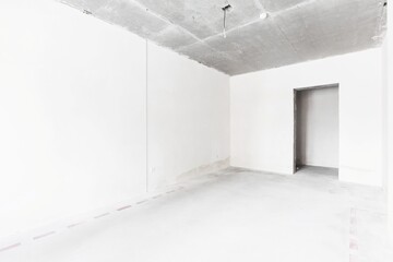 interior of the apartment without decoration in gray colors. rough finish