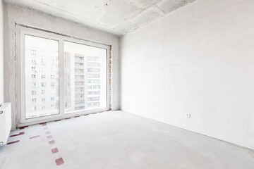 interior of the apartment without decoration in gray colors. rough finish
