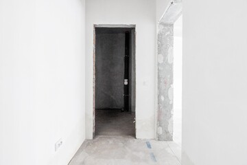 interior of the apartment without decoration in gray colors. rough finish