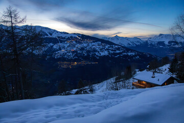 Swiss ski resort in Valais in winter - 703443315
