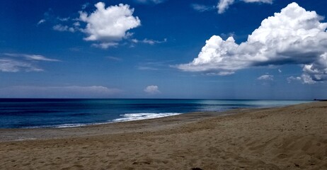 clouds over the beach