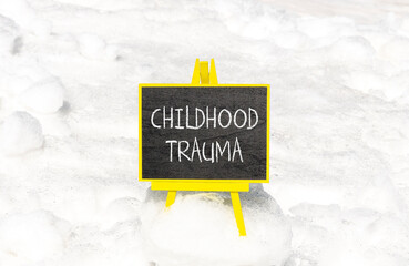 Childhood trauma symbol. Concept words Childhood trauma on beautiful black chalk blackboard....