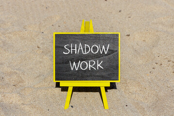 Shadow work psychology symbol. Concept words Shadow work on beautiful black chalk blackboard. Beautiful sand sea beach background. Psychology shadow work concept. Copy space.