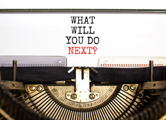 What will you do next symbol. Concept words What will you do next typed on beautiful old retro typewriter. Beautiful white background. Business, what will you do next concept. Copy space.