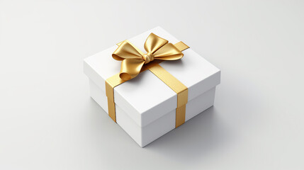 White present box with gold ribbon and bow isolated on grey white background.