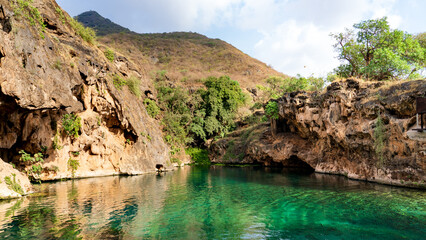 Obraz premium Ain Sahlanout is a picturesque water spring located in the Sultanate of Oman