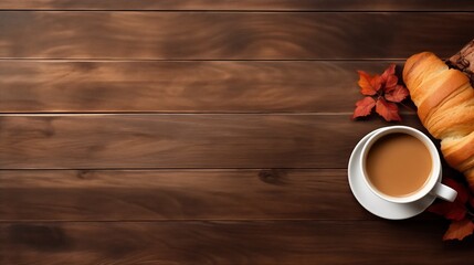 A cup of coffee with bread on wood background with  with copy space.