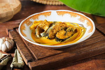 Gurameh dishes with yellow spices. Indonesian traditional food.