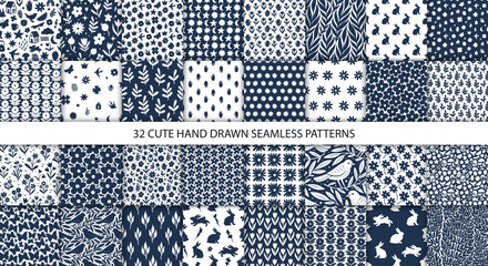 32 cute doodle seamless patterns. Hand drawn seamless pattern with flowers leaves birds and symbols - 703465365
