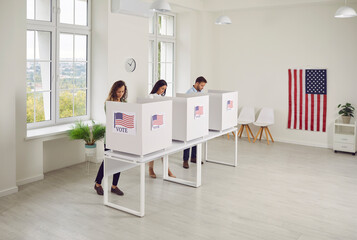 American citizens people USA voters standing in a row at polling station at vote center with us...