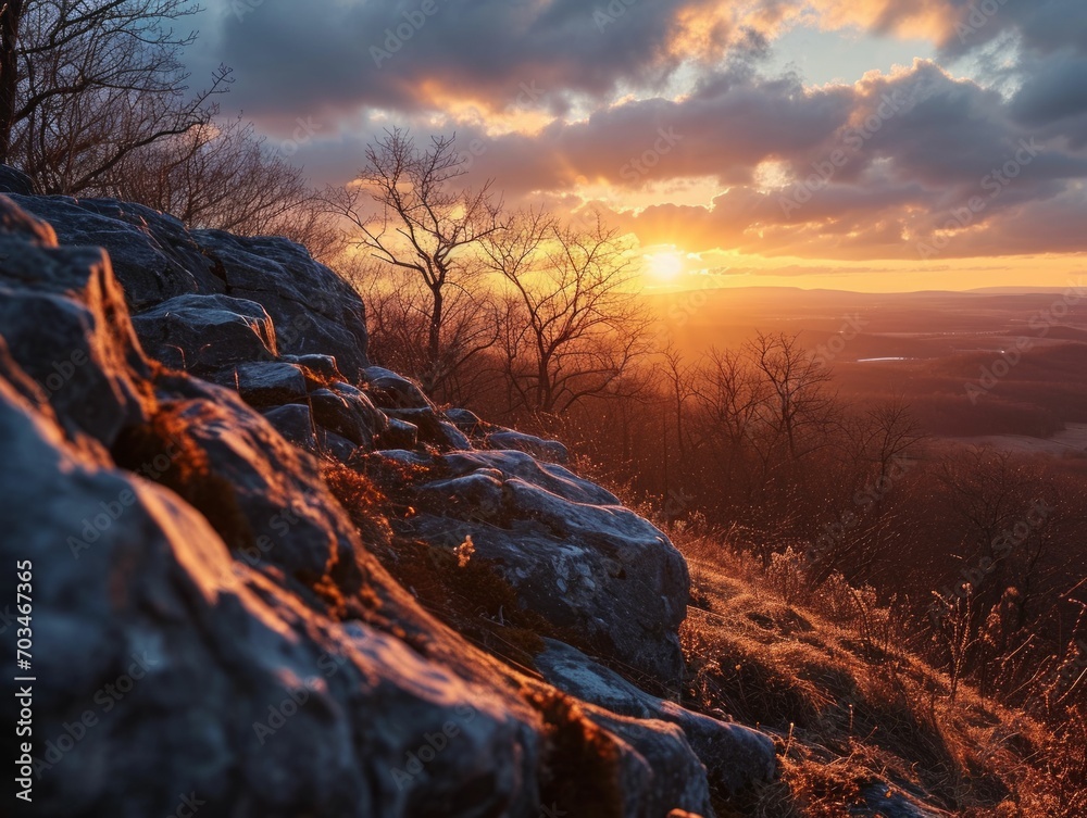 Sticker Wide-angle shot of the sun setting on the first day of spring, casting warm, golden hues across the landscape.