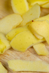 yellow ripe apple with cinnamon on the table