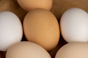fresh chicken eggs on the kitchen table