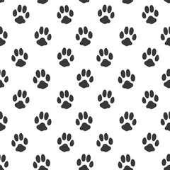 Fototapeta premium Cute doodle cat or dog paws print seamless pattern, neutral animal cat dog hand drawn background