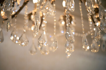 Beautiful close up crystal chandelier light with bokeh effect