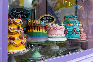 London, UK - December 20, 2023, colorful cakes in a display case, gluten free