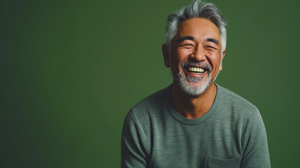 Obraz premium Beautiful senior male model with grey hair smiling