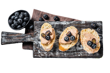 Toast with Foie gras pate and fresh blueberry on wooden board.  Transparent background. Isolated.