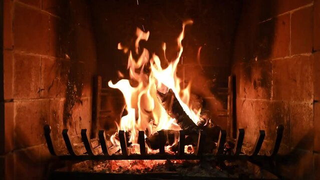 fire burns in the fireplace