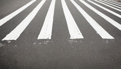white stripes on asphalt road