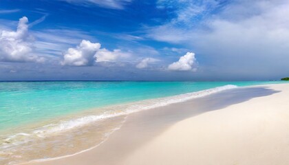 Fototapeta na wymiar beautiful sandy beach with white sand and rolling calm wave of turquoise ocean on sunny day on background white clouds in blue sky island in maldives colorful perfect panoramic natural landscape