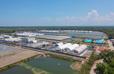 Aerial top view of metropolitan provincial waterworks industry factory in urban city town. Water utilities service. - obrazy, fototapety, plakaty