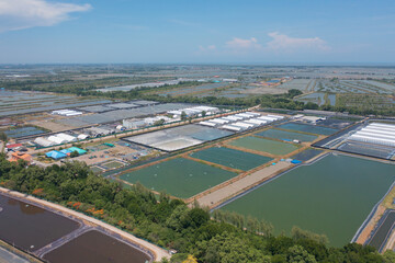 Aerial top view of metropolitan provincial waterworks industry factory in urban city town. Water utilities service. - obrazy, fototapety, plakaty