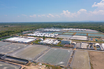 Aerial top view of metropolitan provincial waterworks industry factory in urban city town. Water...
