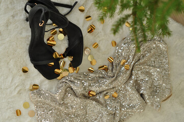 black shoes and festive confetti