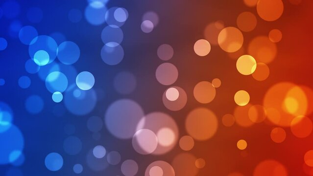 Blue and orange glowing bokeh particles animation.Blue and orange background.Moving bubbles colorful blurred animation.Animated background blue and orange with the colors alternating the position.