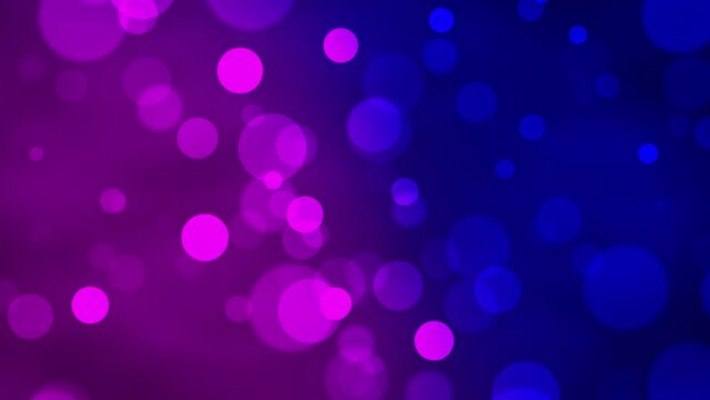 Blue and Purple glowing bokeh particles animation.Blue and Purple background.Moving bubbles colorful blurred animation.Animated background blue and purple with the colors alternating the position.
