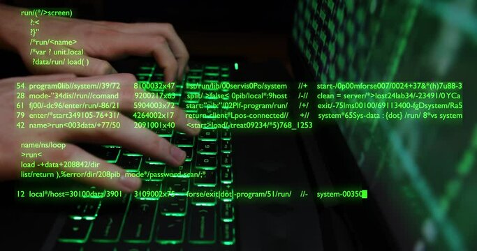 Close up of hands typing code on a laptop keyboard with multiple layers of codes and program software. Hacking or programming concept