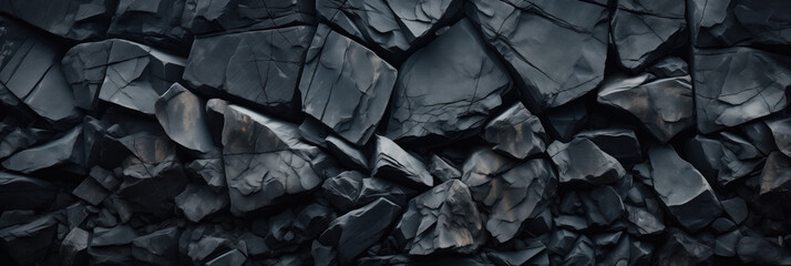 Black stone wall texture background, panoramic image of dark stone wall
