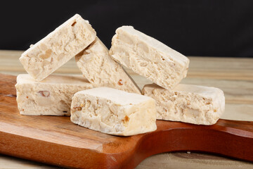 Traditional Italian nougats on cutting board.