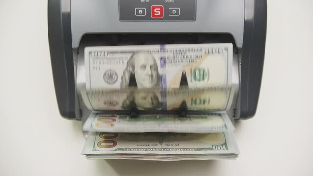 Money Counting Machine Processing US Dollars