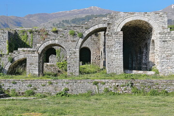 Fototapeta na wymiar Stepped arcade remains, part of the AD 1812 reconstructions by Ali Pasha Tepelene, upper-central courtyard of the citadel. Gjirokaster-Albania-205+