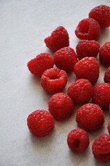 fresh tasty raspberries with white background