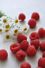 fresh tasty raspberries with white background