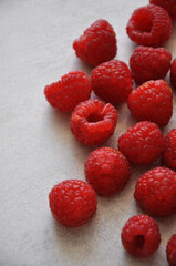 fresh tasty raspberries with white background