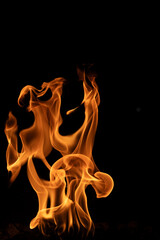 Fire flames isolated on black background, movement of fire flames abstract background
