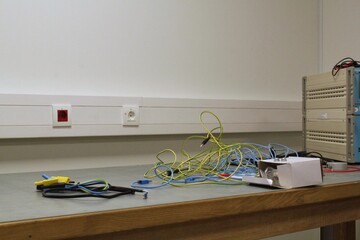 Electrical panel with wires and cables. Electricity equipment. Power line current in an electrical...