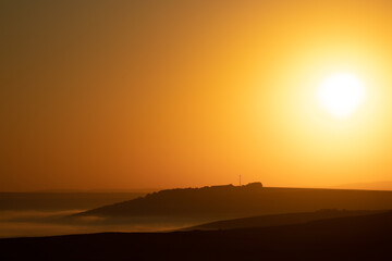 Sunset and beautiful light, sunlight illuminating the colorful sky, clouds