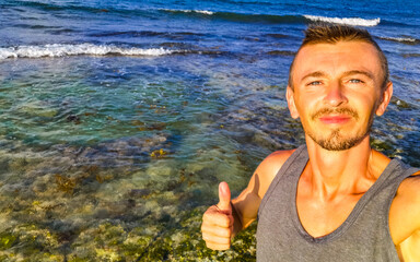 Male tourist Travelling man taking selfie Playa del Carmen Mexico.