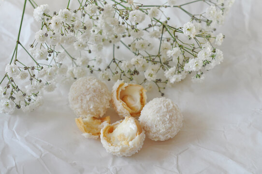 tasty candies with white flowers