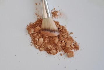 make up brush with powder