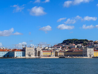 Lisbon Comercio Square and Castle Hill seen from Tagus River